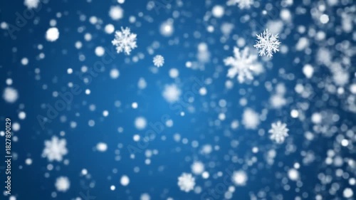 A magical winter Christmas background with beautiful falling snowflake particles and soft blue bokeh lights, perfect as a festive overlay