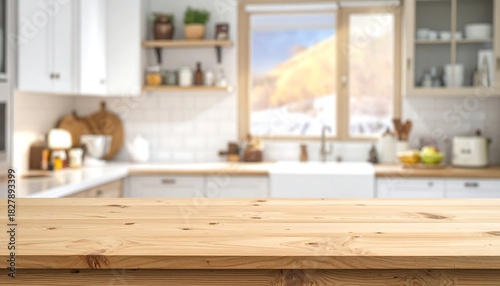 Bright kitchen with a wooden counter in the foreground, snowy mountain seen through the window