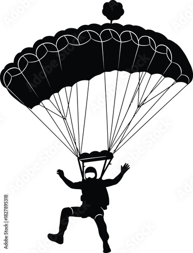 Silhouette of a skydiver under a parachute in freefall