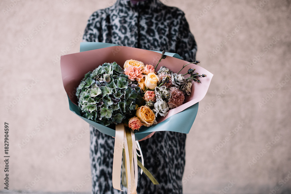 custom made wallpaper toronto digitalVery nice young woman holding big and beautiful bouquet of fresh hydangea, roses, carnation flowers in green and pink colors, close up cropped image