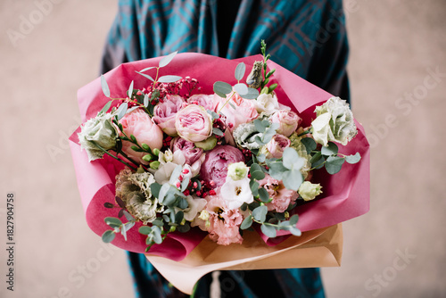 Wallpaper Mural Very nice young woman holding big and beautiful bouquet of fresh roses, eustoma, eucalyptus flowers in pink and white colors Torontodigital.ca