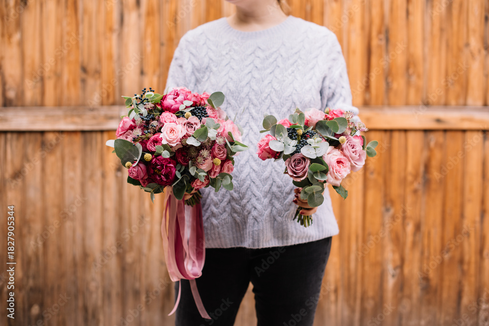 custom made wallpaper toronto digitalVery nice young woman holding two beautiful bouquet of fresh roses, carnations, eucalyptus and other flowers in tender and vivid pink colors