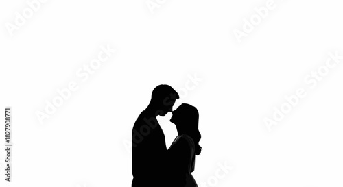 Silhouette of a loving couple embracing each other in a tender moment.