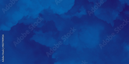 nebula gas cloud in deep outer space. Abstract soft sky blue watercolor sky and clouds, Navy blue watercolor background. grunge background with copy space for text .
