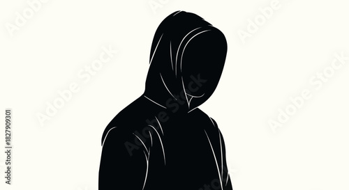 Silhouette of a person wearing a black hoodie looking down in contemplation.