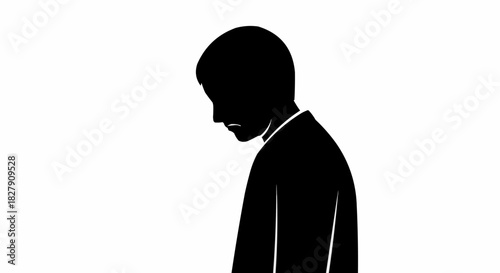 Silhouette of a person with head bowed down in deep thought and contemplation.