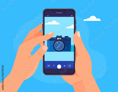 Hands holding a smartphone displaying a camera icon against a sky background, suggesting photography or mobile technology.