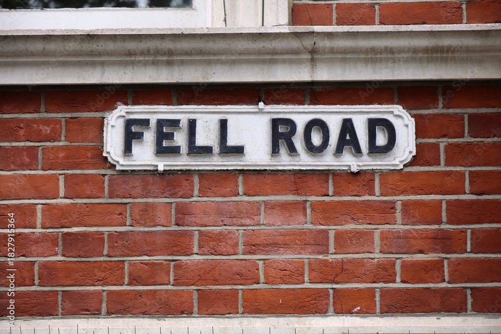Obraz premium Croydon town in South London, UK. Street name sign for Fell Road.