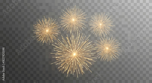 Golden fireworks exploding in a festive display against a dark sky