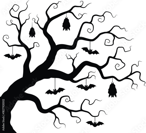 Spooky silhouette of a bare tree adorned with hanging bats for Halloween.