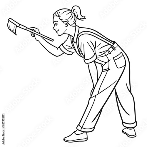 Woman in overalls painting with a brush