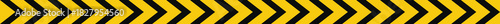 Warning tape with yellow and black diagonal stripes. Warn stop seamless line. Yellow and black caution tape border. Long danger ribbon. Vector illustration on transparent background