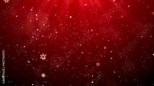 Red background with falling golden snowflakes and particles for christmas celebration theme