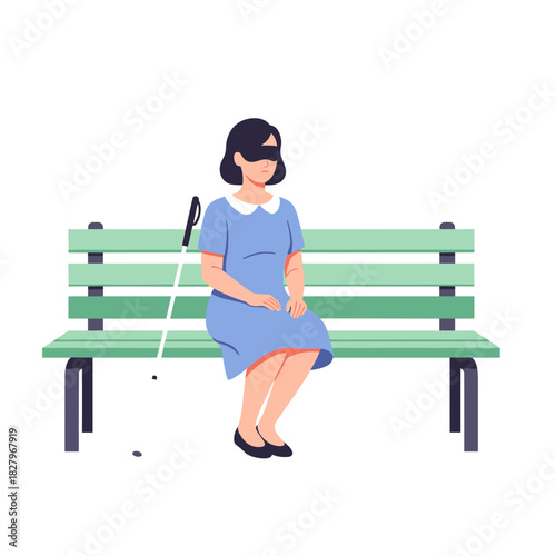 Blind woman sitting on a park bench with a white cane  