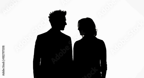 Silhouetted couple facing each other in a moment of connection and intimacy.