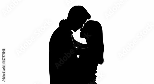 Silhouette of a loving couple embracing intimately in a tender moment of affection.