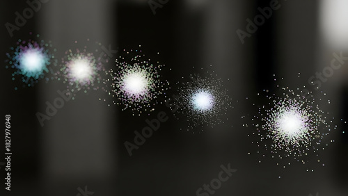 Abstract sparkling light effects on a dark background with bright particles