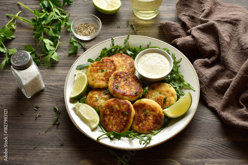 Potato pancakes made from mashed potato and minced fish served with dipping sauce