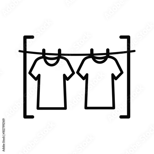 Two tshirts hanging on a clothesline, isolated on