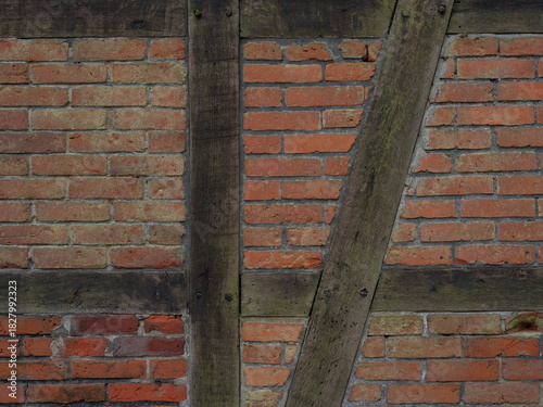 The wall of an old half-timbered brick house