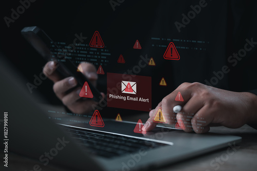 A digital phishing email alert displayed on a laptop as a user checks a smartphone, highlighting cybersecurity risks, online threats, and the importance of protecting sensitive information in modern t