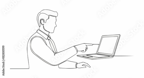 Man pointing at laptop screen, focused on technology and work.