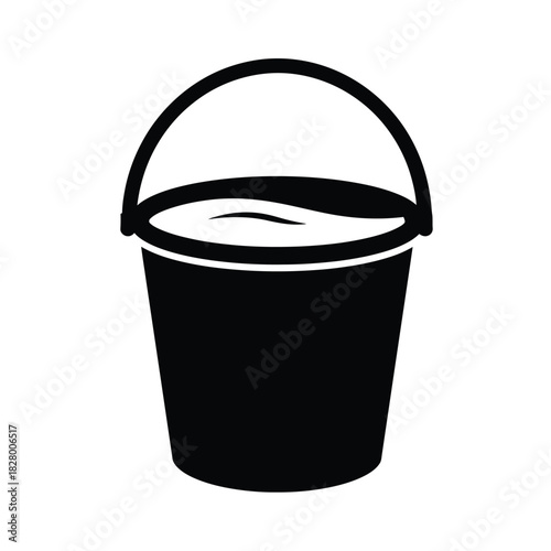 Black bucket with handle filled with liquid water