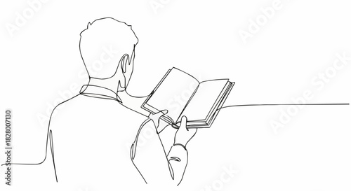 Person reading a book with focus and concentration.