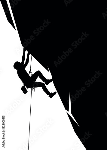 Silhouette of a climber ascending a steep rock face