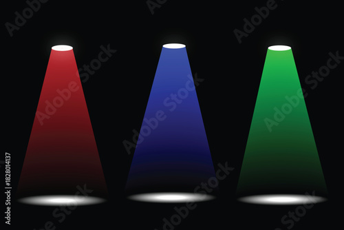 Three colored spotlights shine down on a dark background
