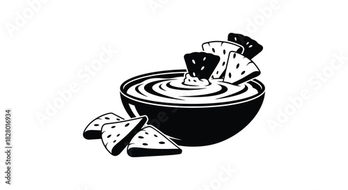 Bowl of dip with pita bread wedges silhouette