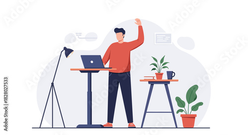 Man Working on Laptop at Adjustable Standing Desk