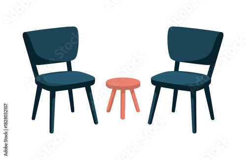 Two dark blue chairs face each other with a small coral table in between.