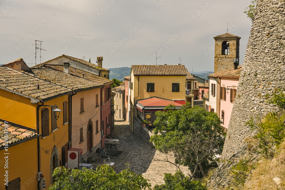 Fototapeta premium Imposing circular tower and curtain wall of the historic Rocca di Montebello in Emilia-Romagna.