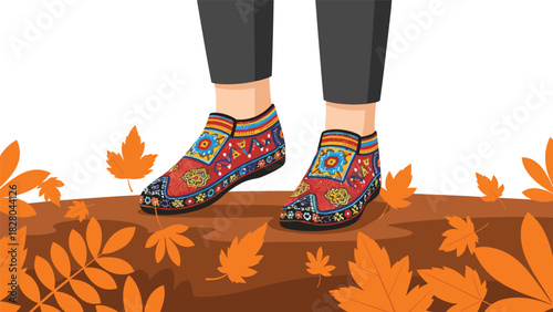 Fashionable feet stepping through autumn leaves wearing vibrant ethnic shoes with intricate designs and warm fall tones for seasonal style