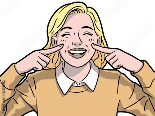 A blonde woman joyfully points to her freckled cheeks while smiling widely, showing happiness.