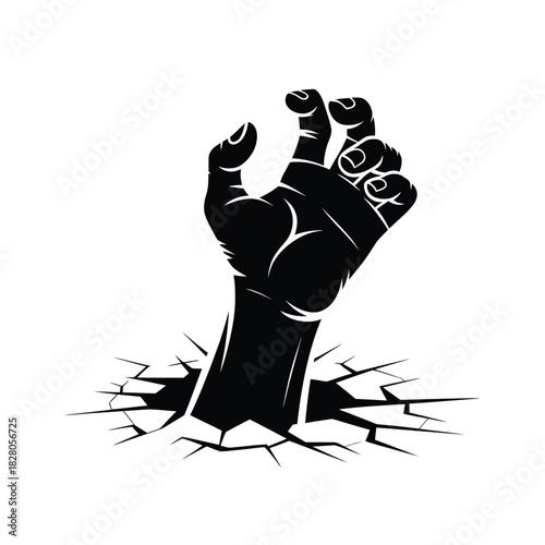 Black hand reaching out from cracked ground