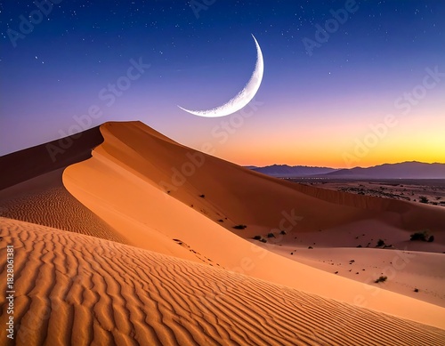 Fototapeta Naklejka Na Ścianę i Meble -  Crescent moon shines over vast, textured sand dunes at dusk, with distant mountains and twilight sky