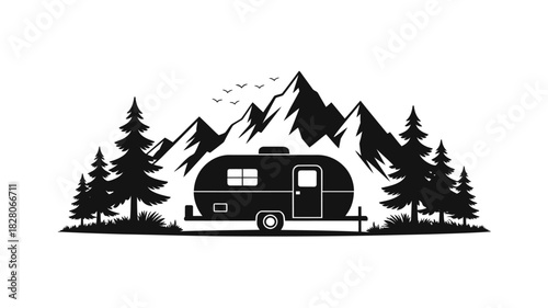 Vintage camper in a mountain forest landscape silhouette