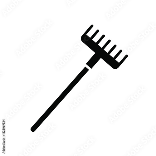 Black silhouette of a garden rake on white background 1