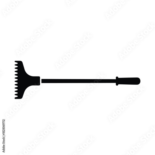 Black silhouette of a garden rake on white background 2