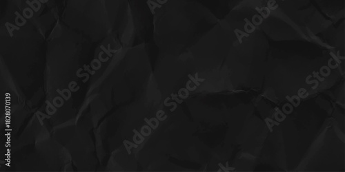 Black crumpled paper texture pattern. close up white crumpled paper background. Top view.