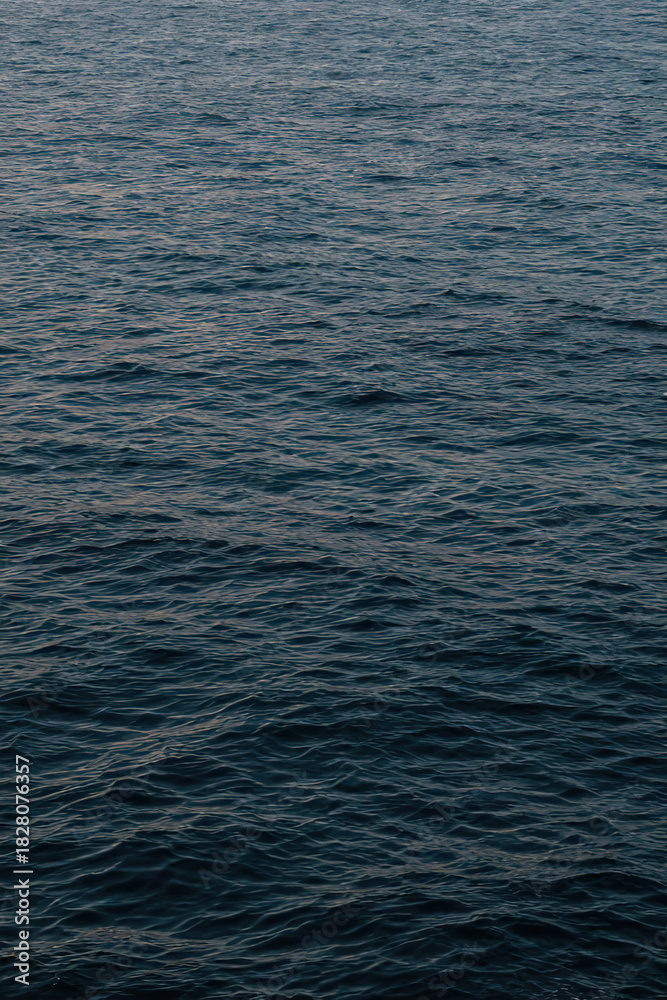 Fototapeta premium Abstract sunlight blue sea background.