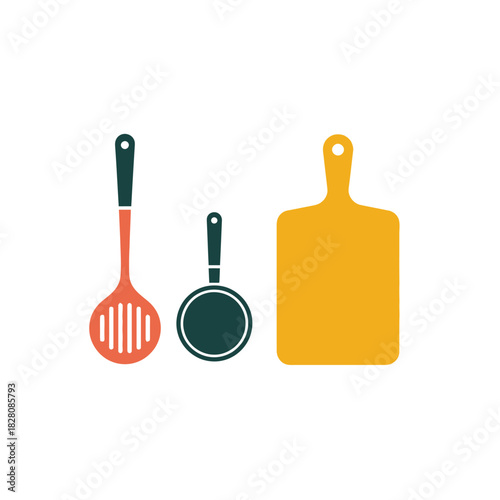 A slotted spoon, a small frying pan, and a cutting board are neatly arranged.