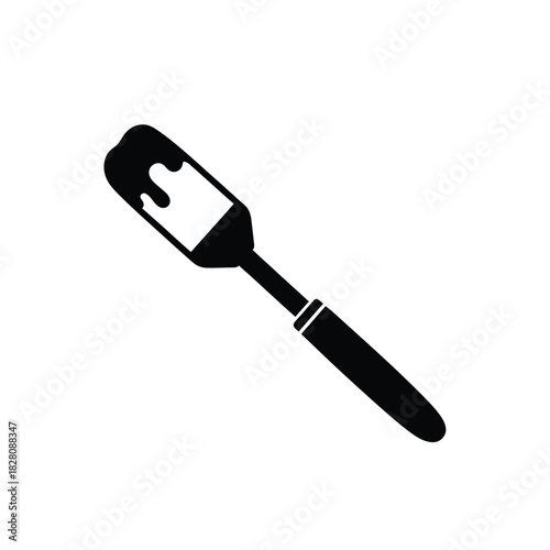 Black spatula with white icing dripping vector