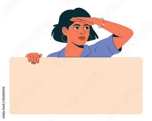 A woman looks into the distance over a blank sign board.