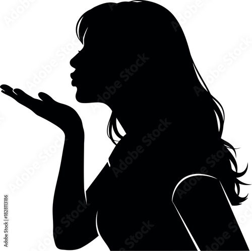 Silhouette of a woman blowing a kiss with open hand gesture