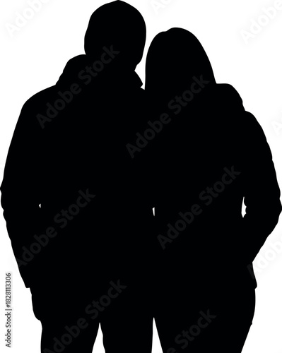 Silhouette of a loving couple standing close, embracing each other