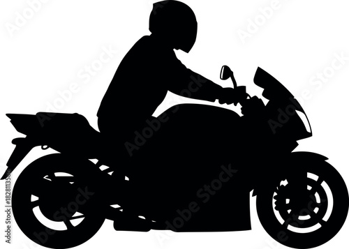 Silhouette of a person riding a sport motorcycle with a helmet