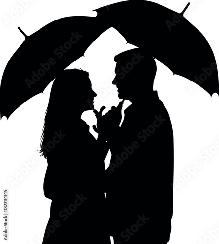 Silhouettes of a romantic couple under umbrellas, sharing love